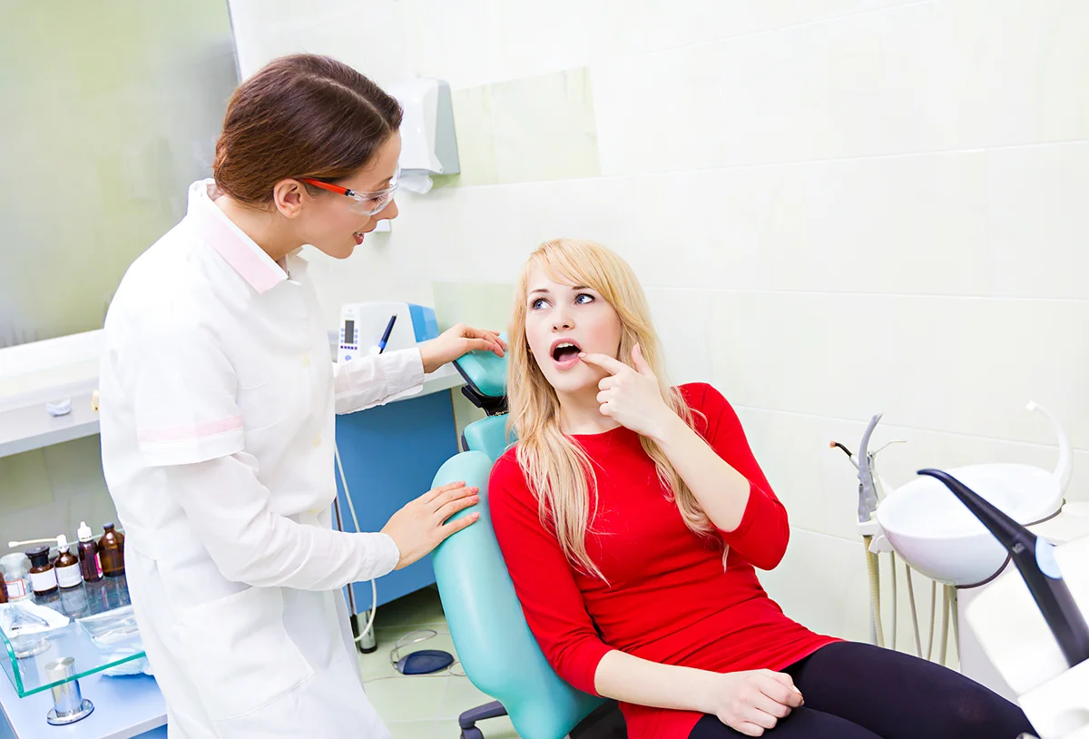Gingivitis simptomi in znaki